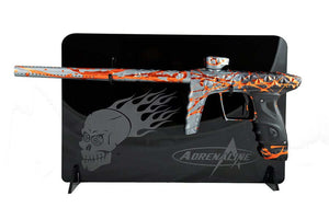 Gun display stands featuring a painted paintball gun on a stylish display backdrop.